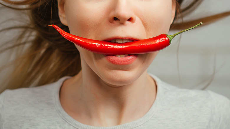 Eating spicy pepper