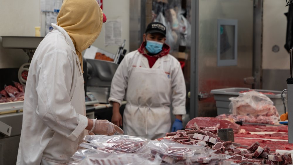 Meat packers at independent butcher