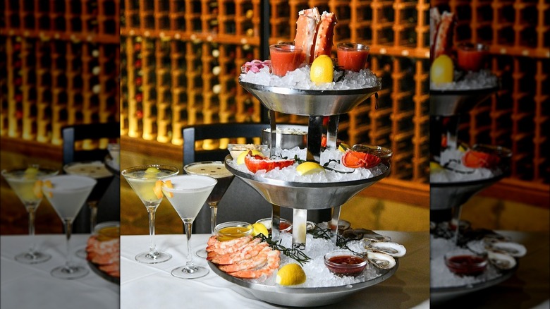 seafood tower with cocktails