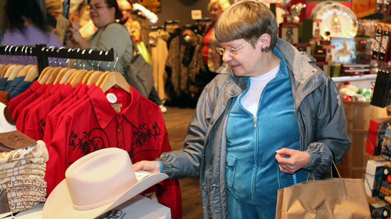 older lady shops in cracker barrel store