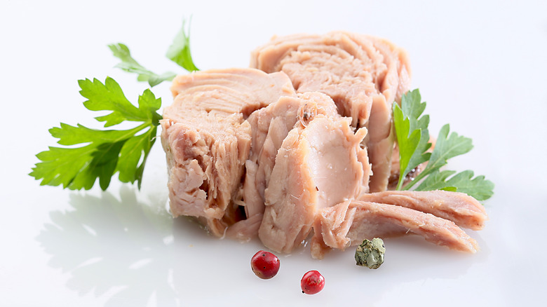 Chunks of tuna fish on white background