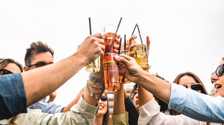 People toasting with mocktails