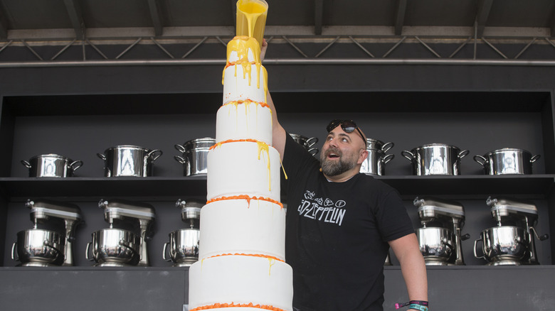 Duff Goldman frosting tall cake