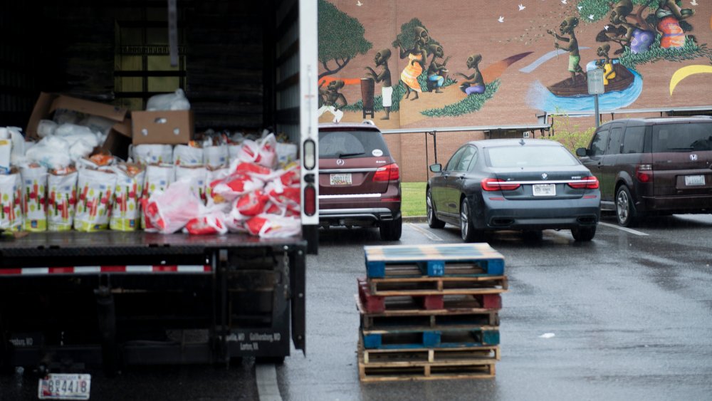 Trucks ready to unload food at a food bank