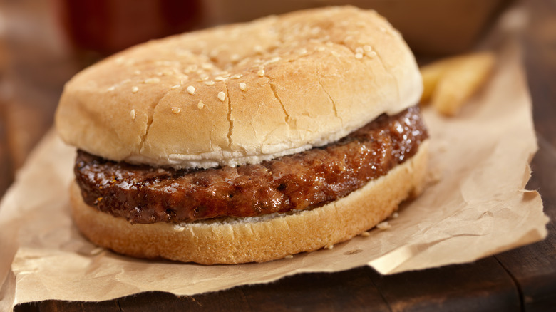 Plain hamburger on brown paper