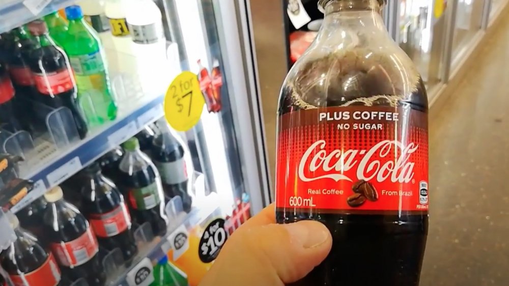 Bottle of Australian Coca-Cola plus coffee 