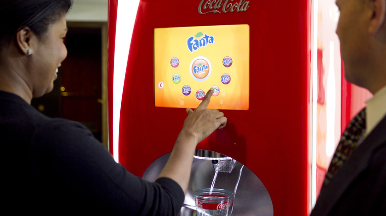 People trying Coca-Cola Freestyle machine