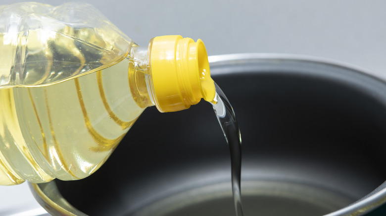 vegetable oil being poured