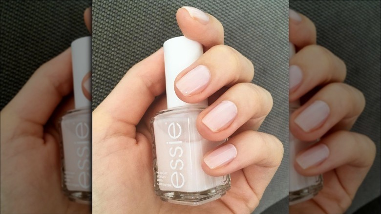 hand with Essie's ballet slippers color