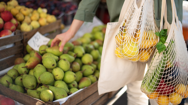 Person shopping at a farmers market