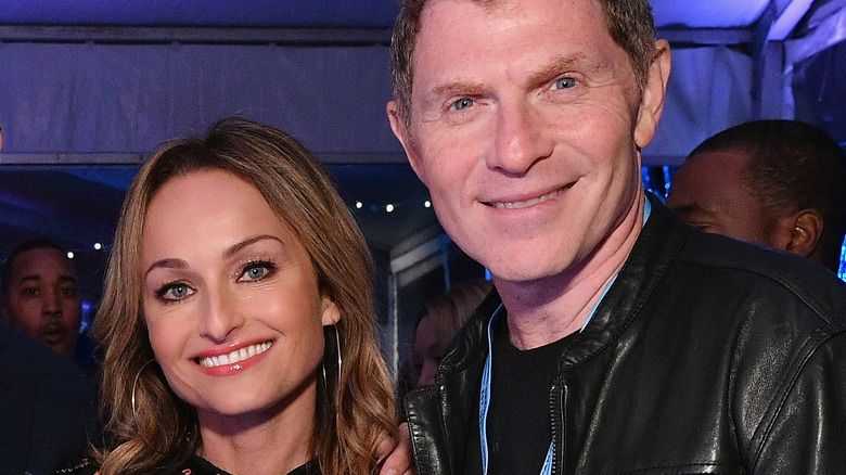 Bobby Flay and Giada De Laurentiis smiling