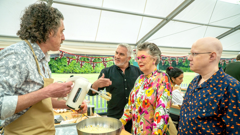 Giuseppe speaks to GBBO judges