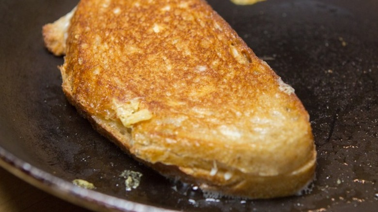 grilled cheese sandwich in a skillet