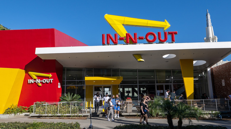 People walking around an In-N-Out