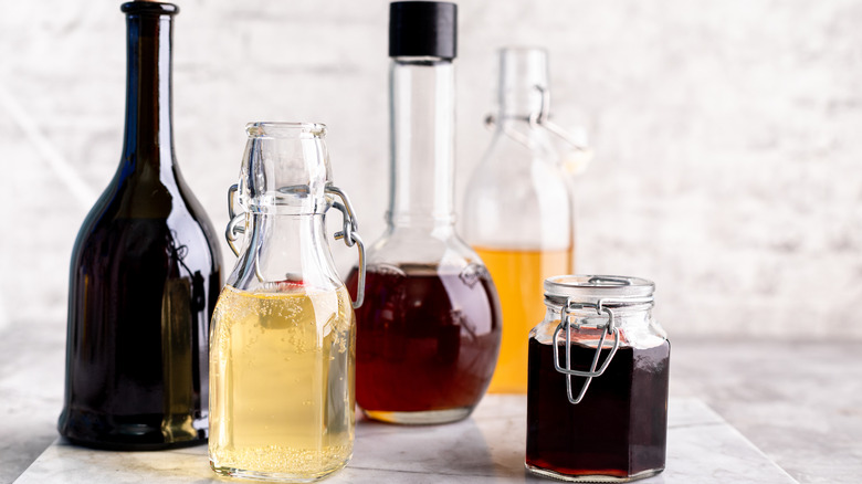 Various vinegars in glass containers