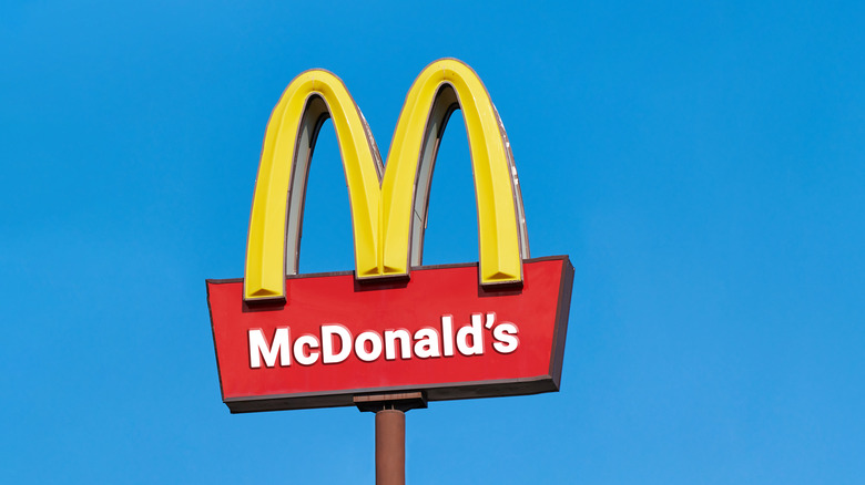 McDonald's store logo against blue sky