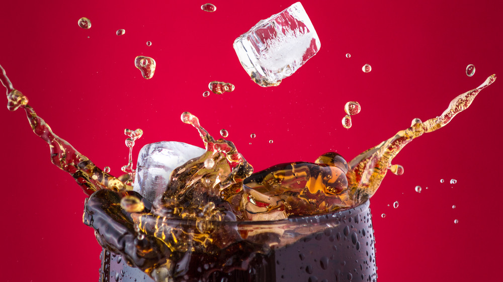 Glass of Coca-Cola with ice cubes