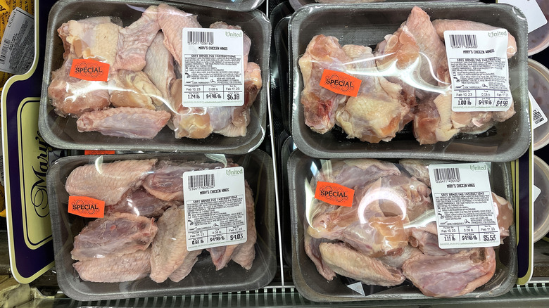 Packages of bone-in chicken