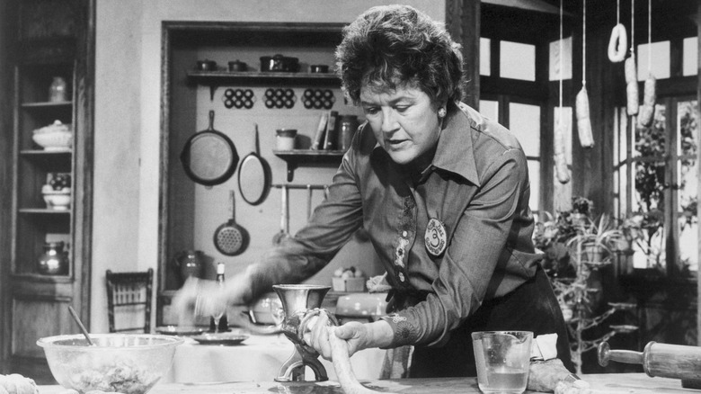 Black and white of Julia Child in cooking show