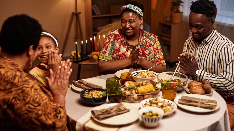 Happy family at Kwanzaa feast