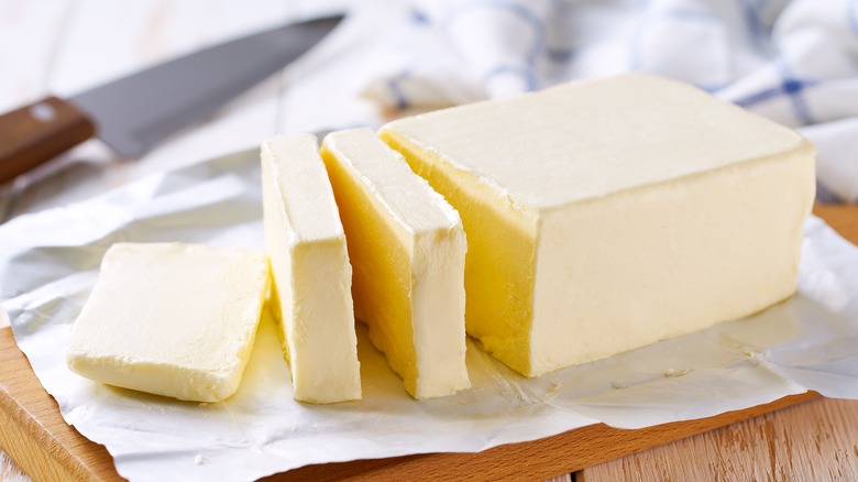 Partially sliced block of butter