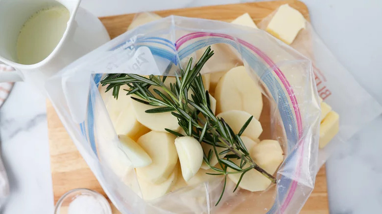 potatoes, garlic, and herbs in a sous vide bag