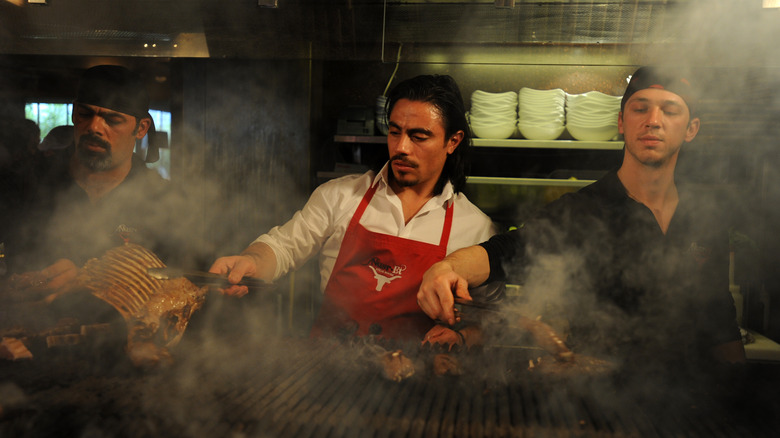 Salt Bae cooking meat