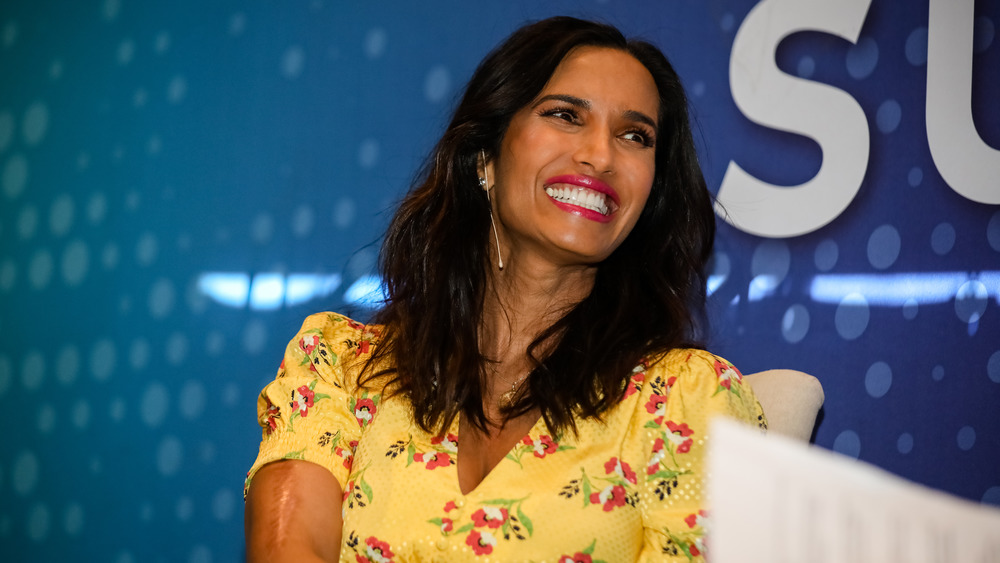 Padma Lakshmi in a printed yellow dress