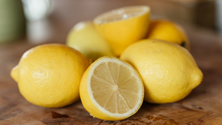 lemons on cutting board