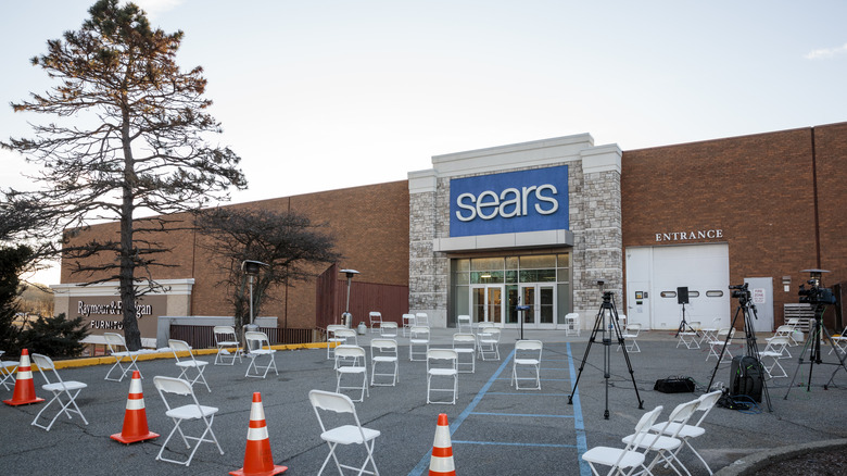 Closed Sears store setting up for press 