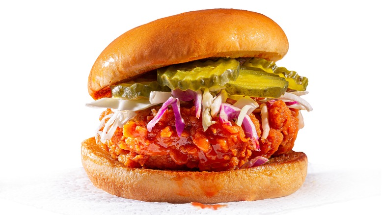 chicken sandwich with slaw and pickles