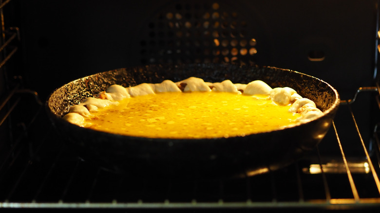 pumpkin pie in oven