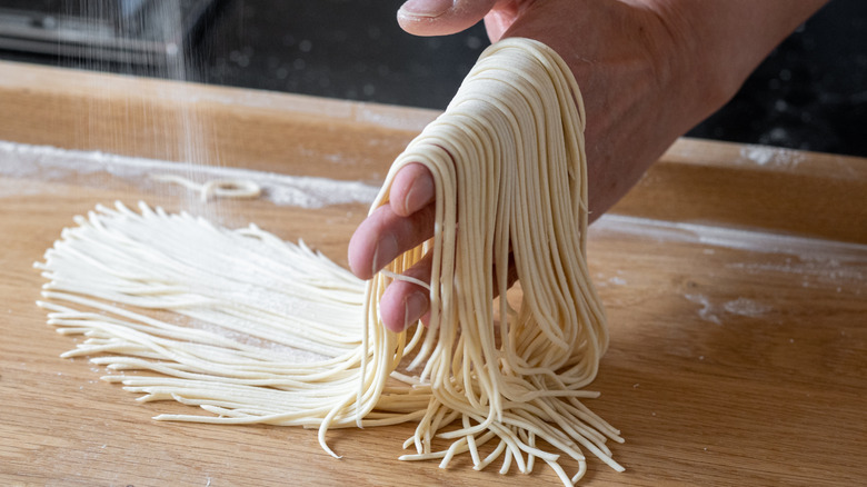 chef making ramen noodles by hand