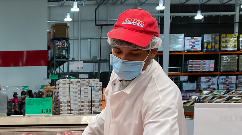 Costco worker wearing mask