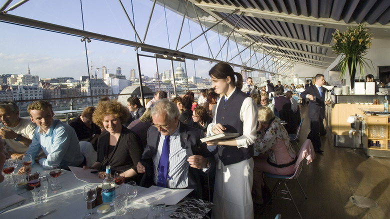 customers at crowded restaurant