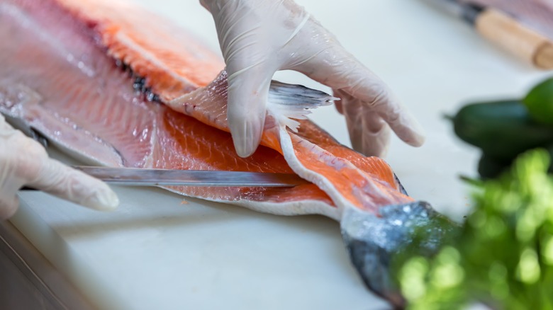 Chef preparing salmon