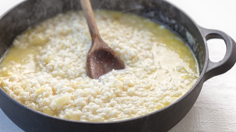 stir risotto to release starch