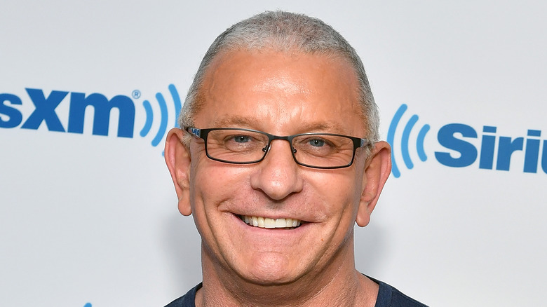 Robert Irvine smiling at event