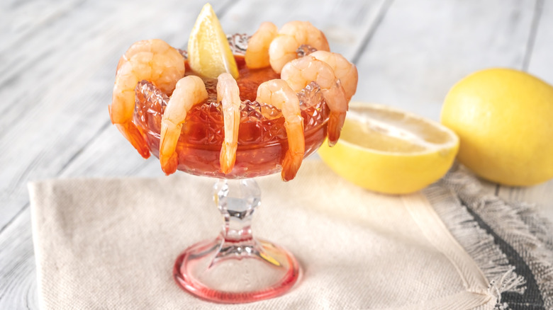 Shrimp cocktail with lemons