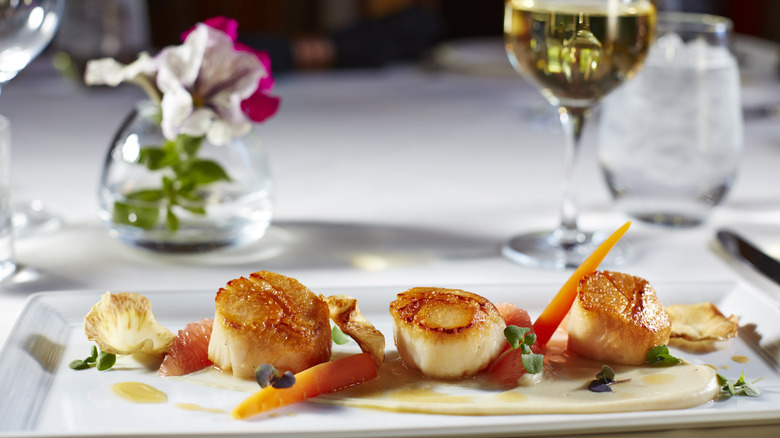 plate of scallops at restaurant