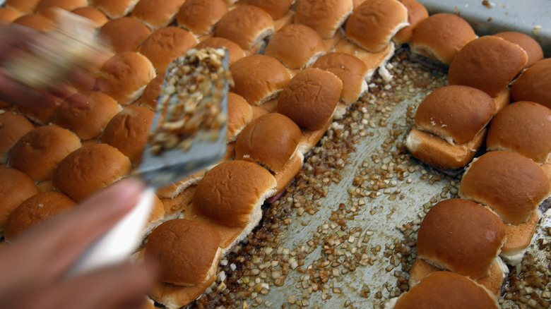 Hamburger buns onions on grill