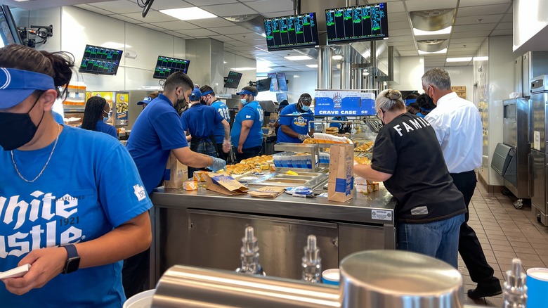 Fast food workers in kitchen