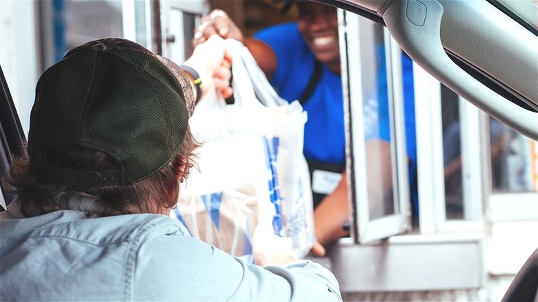 Drive-thru service at car