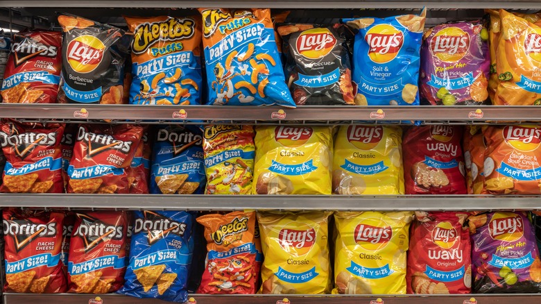 Bags of Frito-Lay products lined up in grocery store