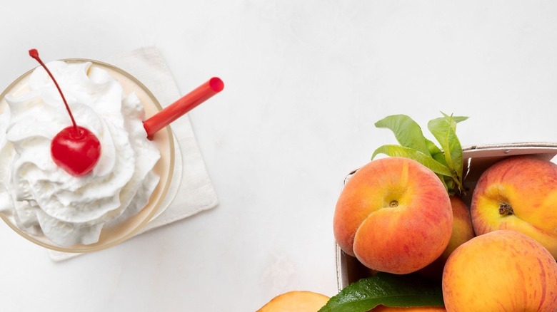 Peach milkshake with fresh peaches