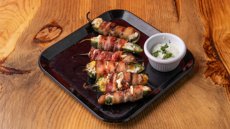 Bacon-wrapped stuffed jalapeños