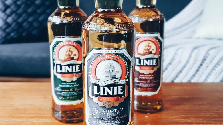 Three bottles of Linie Aquavit