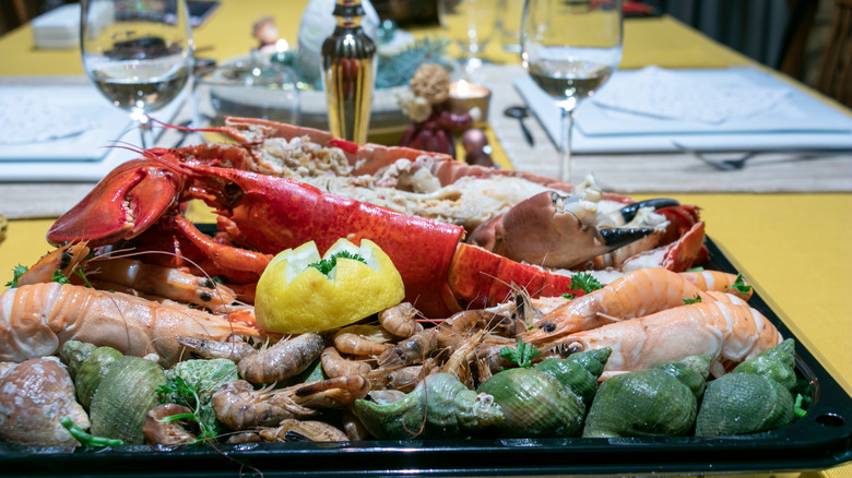 Seafood platter with wine glasses