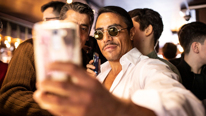 Salt Bae taking selfie with fan