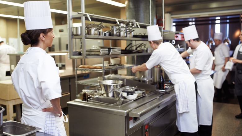 chefs working in kitchen